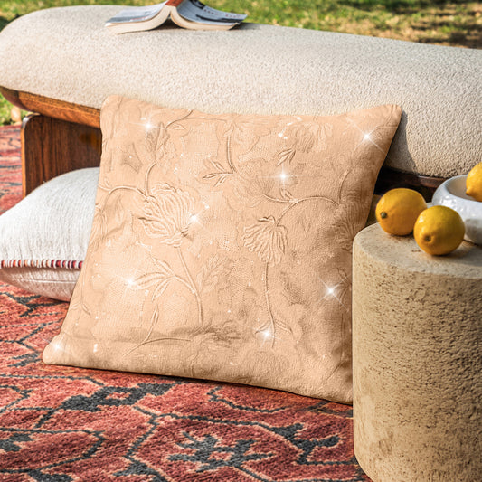 Golden beige floral jacquard cushion cover on outdoor bench, patterned rug, lemons nearby