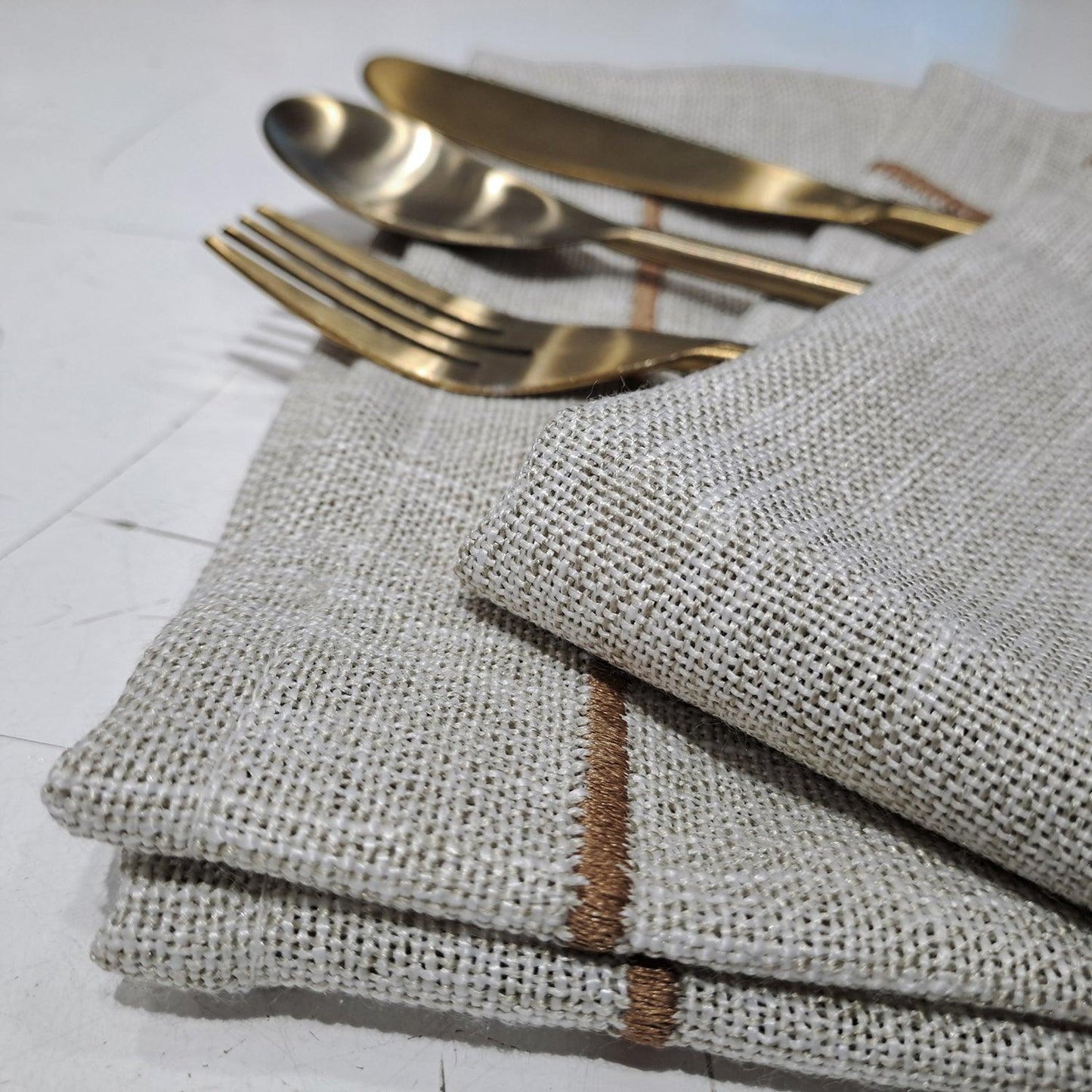 Enera Table Napkin in Cream Color
