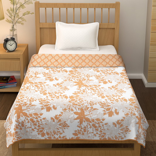 Single bed with floral orange and white bedsheet, white pillow, modern bedroom decor