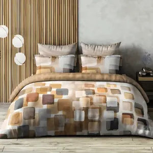 Modern bed with geometric print bedsheet, matching pillows, and contemporary bedroom decor