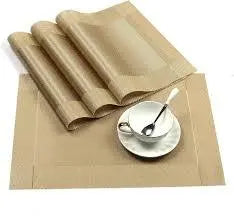 Beige table mats with a cup and saucer set, dining table essentials for home decor