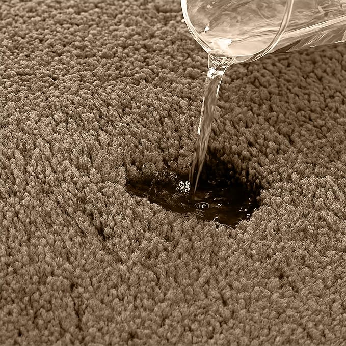 Water being poured onto an absorbent brown bathmat surface showing high absorbency