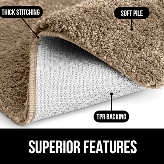 Close-up of a brown bathmat showing soft pile, thick stitching, and non-slip TPR backing.