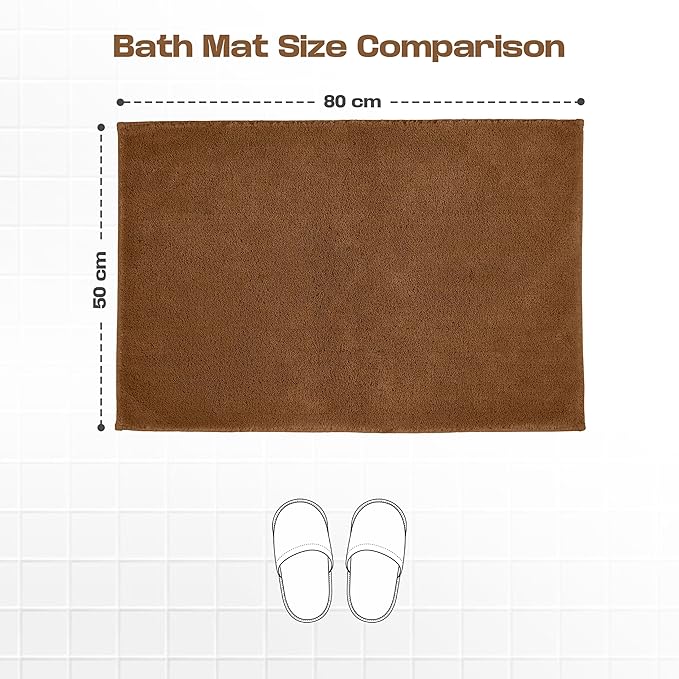 Brown bath mat size 50x80 cm on tiled floor with slippers for scale