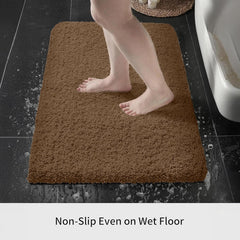 Brown bathmat on wet bathroom floor with bare feet, non-slip, absorbent, home essentials