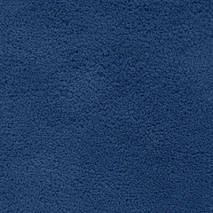 Soft textured blue bathmat surface, plush fabric home essential