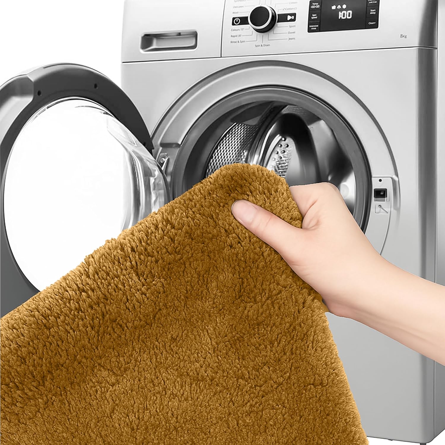 Hand holding a brown bathmat in front of a washing machine, showing easy washable home essentials.