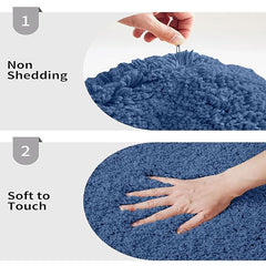 Blue bathmat with non-shedding and soft touch features, hand pressing surface