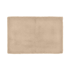 Beige rectangular bathmat with soft textured surface on white background